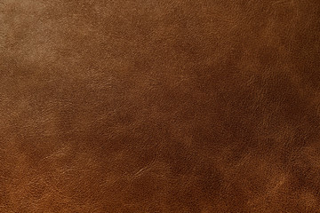 Brown leather texture background, genuine leather, top view. Brown leather texture - skin animal. Texture for design. Can be used as background wallpaper and background for design-works.