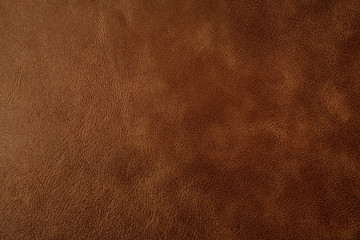 Brown leather texture background, genuine leather, top view. Brown leather texture - skin animal. Texture for design. Can be used as background wallpaper and background for design-works.