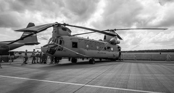 BERLIN, GERMANY - JUNE 02, 2016: The twin-engine, tandem rotor heavy-lift helicopter Boeing CH-47 Chinook. US Army. Black and white. Exhibition ILA Berlin Air Show 2016