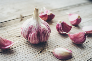 Rustic style garlic on vintage wooden background