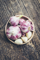 Rustic style garlic on vintage wooden background