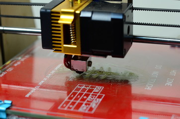 3D printer prints red form