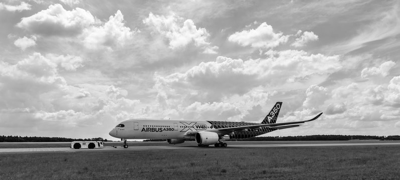 BERLIN, GERMANY - JUNE 02, 2016: The newest Airbus A350 XWB at the airfield. Black and white. Exhibition ILA Berlin Air Show 2016