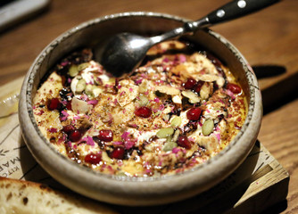 Delicious hummus photo with pomegranate
