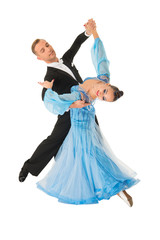 ballrom dance couple in a dance pose isolated on black background