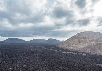 Fototapeta premium Volcanic landscape of Timanfaya National Park on island Lanzarote