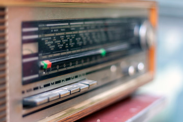 Fototapeta premium detail of an old retro style radio with selective focus