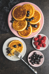 Sweet homemade pancakes with blueberries and raspberries