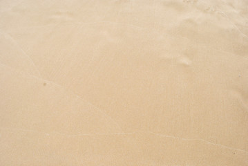 Golden Sand on the beach as background. Sand Texture. Golden sand. Background from fine sand.