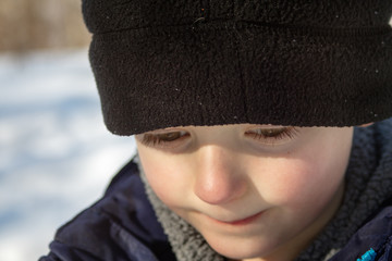 Young Winter Boy Up Close in Hat