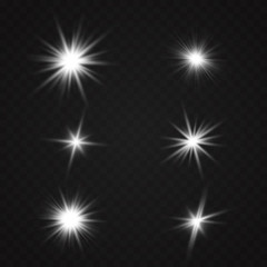 White glowing light explodes on a transparent background. Sparkling magical dust particles. Bright Star. Transparent shining sun, bright flash. Vector sparkles. To center a bright flash.