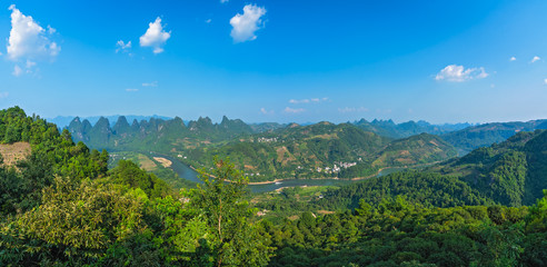 Panorama of Yangshuo karst landscape seen from Xianggong Hill - Powered by Adobe