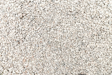 small white stones, pebbles. Background, texture of small stone