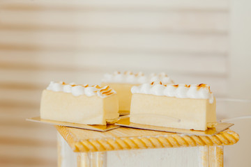 Desserts with fruits, mousse, biscuits. Different types of sweet pastries, small colorful sweet...