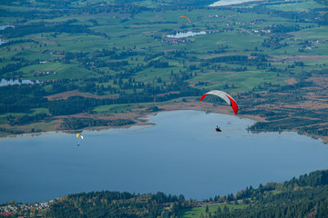 Paragliding in over lakes in Bavarian Alps