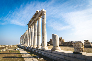 Standing pillars, columns  and other  orginal peaces of  artifacts in reconstruction site of Laodicea in Turkey. Historical greek landmark.