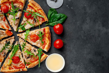 tasty italian pizza with mozzarella cheese, mushrooms, tomato, bell pepper, onion on a stone background with copy space for your text
