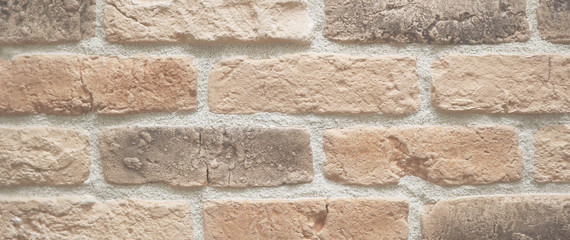 Orange brick wall, abstract background texture. Banner.
