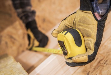 Worker with Measuring Tape