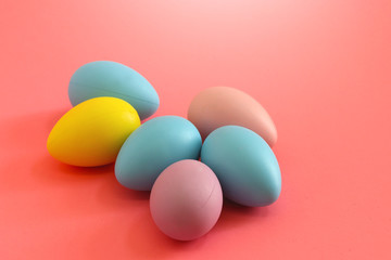 Easter eggs on the pink background. Holiday spring background.