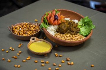 Peruvian food cabrito con frejol