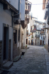 Fototapeta na wymiar February 3, 2020 Candelario Salamanca. Street and old houses of the small town next to the mountain of Gredos.