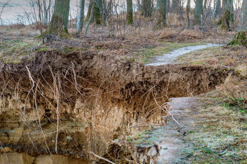 Collapses and breaks from the sea wave. Destruction after the storm.