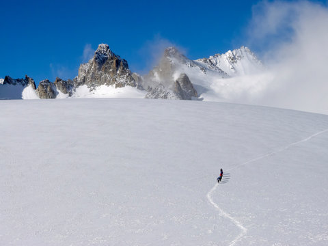 Row of hikers, Glacier du Trient, Mont Blanc Massif, Switzerland,
