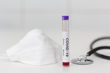 Respiratory mask, stethoscope and blood test for Coronavirus Covid-19