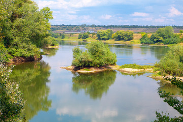 Fototapeta na wymiar scenery with little islands on the river 