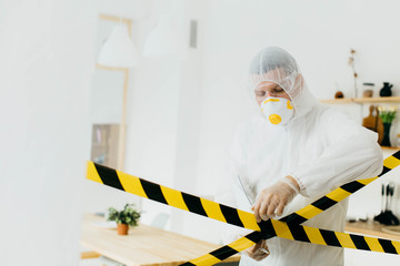 Fototapeta premium The epidemiologist collects specimens for infection in the infection area