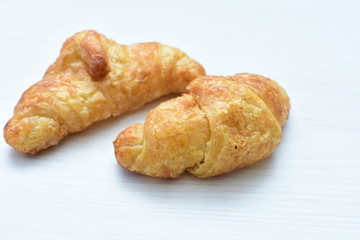 Small, freshly baked butter croissants