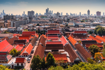 Traditional Thai Architecture with Modern Buildings and Skyscrapers in Background. Cityscape of Bangkok, Thailand as Seen from Temple of the Golden Mount (Wat Saket).