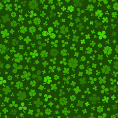Seamless pattern on St. Patrick's Day made of clover leaves in green colors