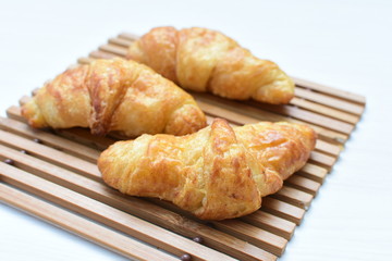 Small, freshly baked butter croissants