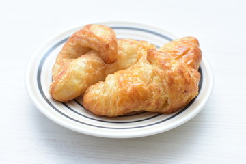 Small, freshly baked butter croissants