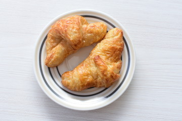 Small, freshly baked butter croissants