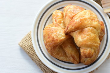 Small, freshly baked butter croissants