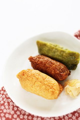 Japanese food, assorted inari-zushi rice and tofu skin on dish,