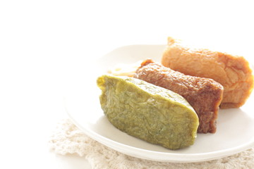 Japanese food, assorted inari-zushi rice and tofu skin on dish,