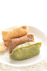 Japanese food, assorted inari-zushi rice and tofu skin on dish,
