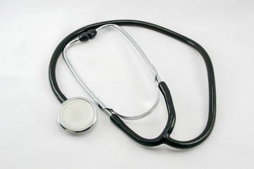black stethoscope on a white background