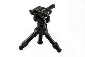 black desktop tripod for camera on white background