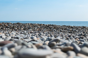 Close-up of pebble beach on the sea