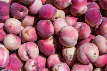 group of fresh peaches background