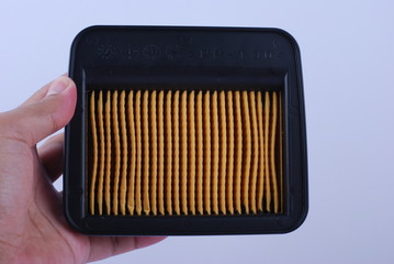 hand hold air filter on white background