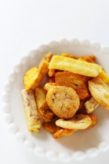 Dried and salted fruit and vegetable on dish