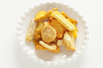 Dried and salted fruit and vegetable on dish