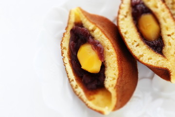 Japanese confectionery food, chestnut and red bean paste Dorayaki Pan cake sandwiches in half