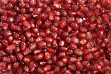 Pomegranate seeds as full frame background texture